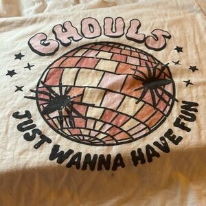 White shirt that says ghouls just wanna have fun with a disco ball and spiders